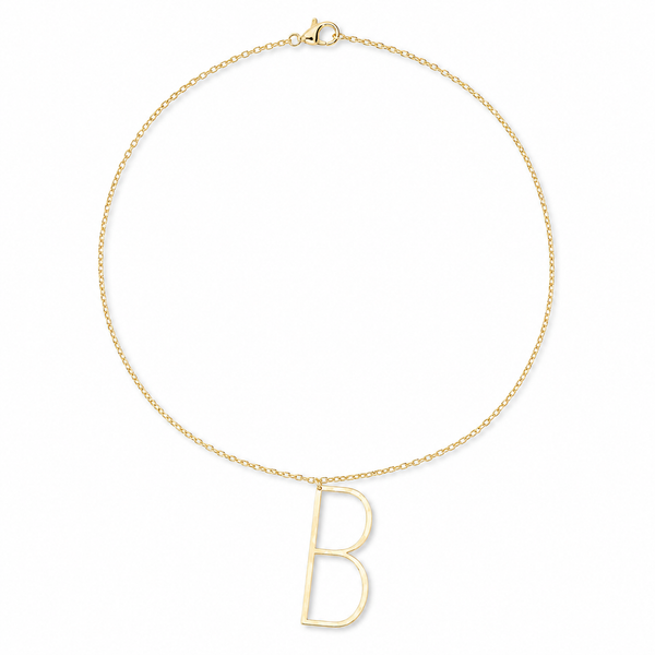 A delicate gold chain necklace with a polished open capital letter 'B' pendant, displayed on a clean white background.